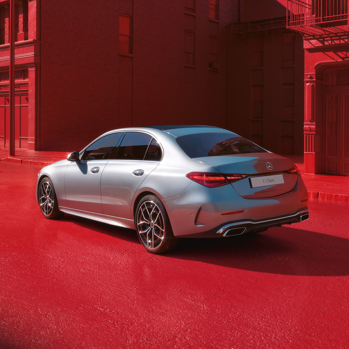 Skematisk fremstilling af bagakselstyringens funktion, f.eks. ved parkering.