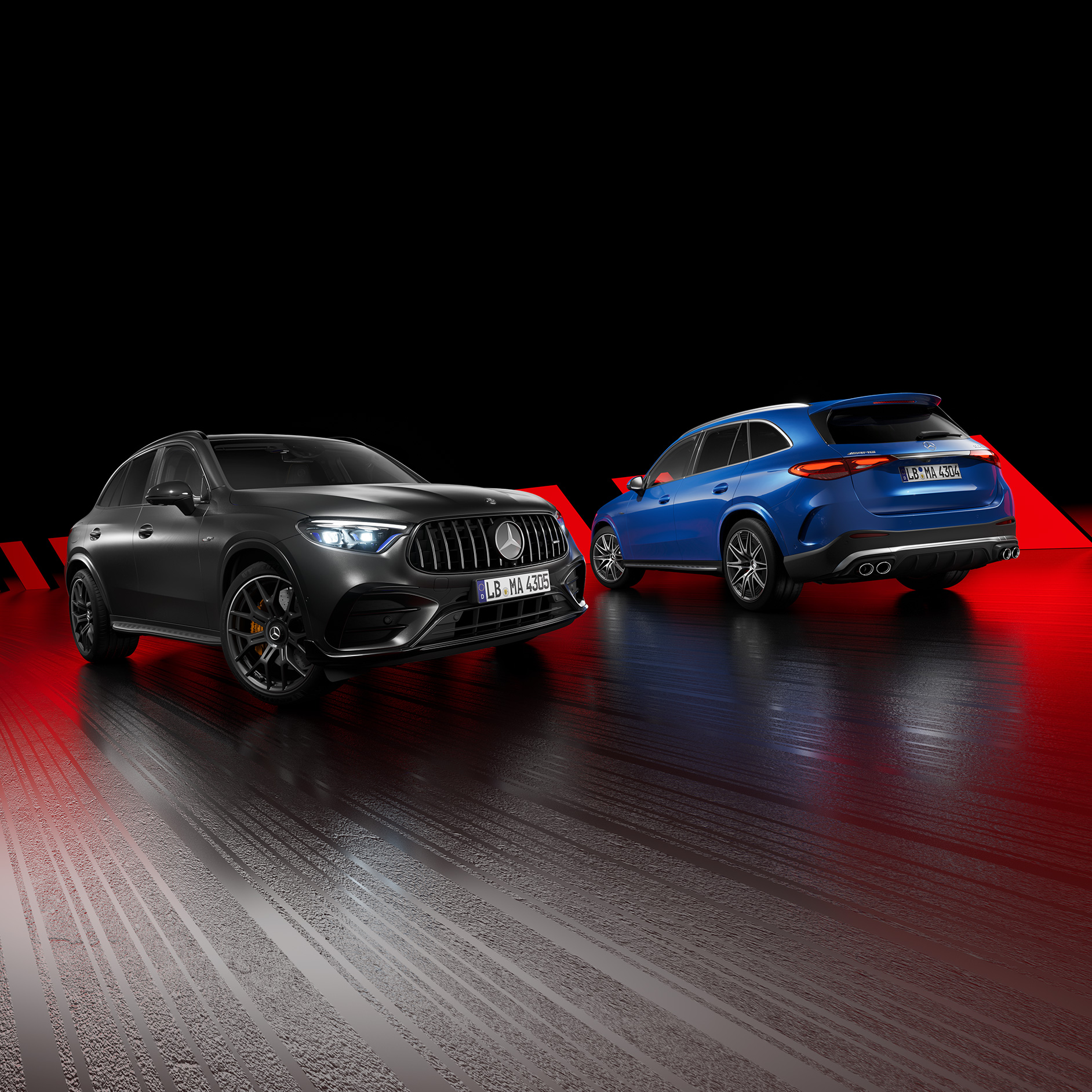 Produktpræsentationer og Car Checks | Oplevelser | Mercedes-AMG En sort og en blå Mercedes-AMG biler side om side