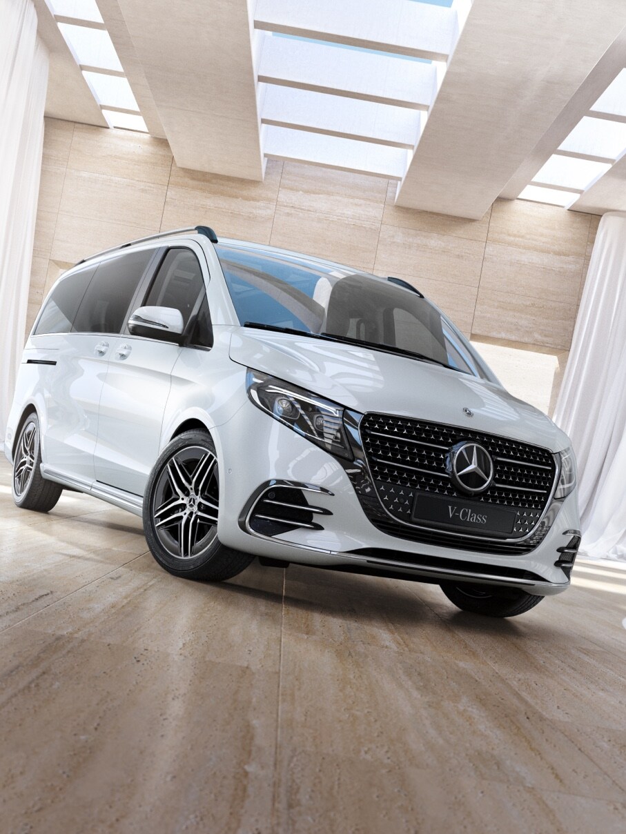 Hvid V-Klasse fra Mercedes-Benz set skråt forfra