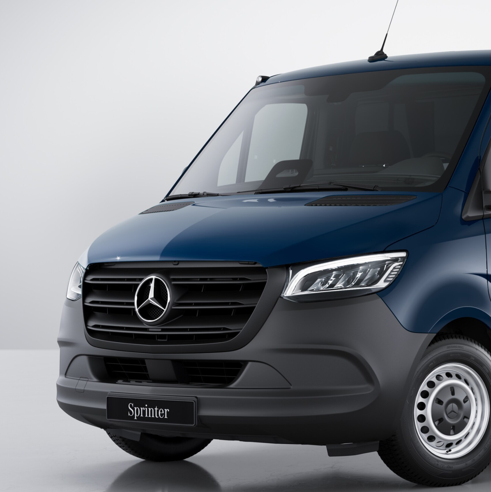 Mørk blå Mercedes-Benz Sprinter Chassis i fotostudie