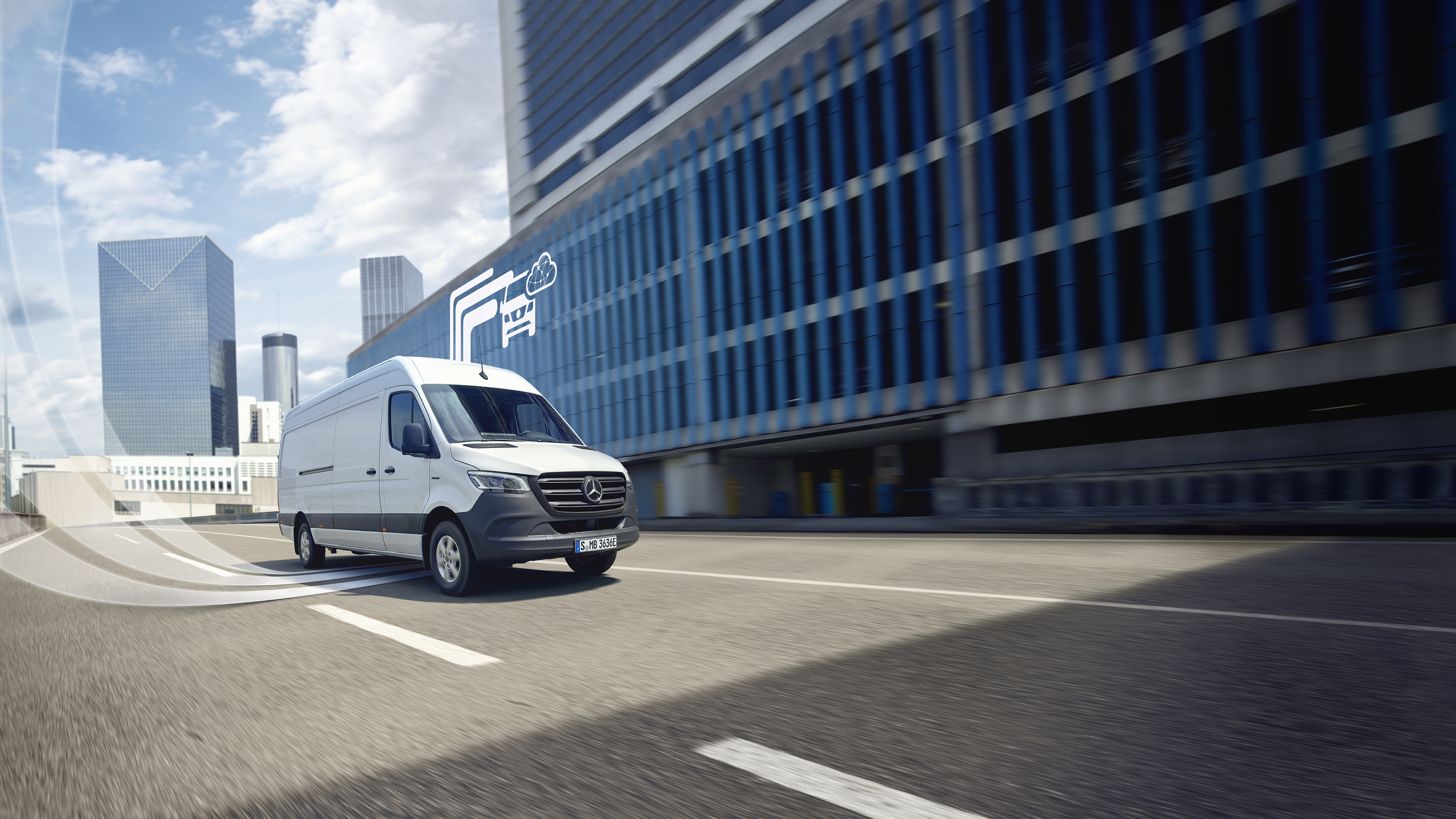 Digitale tjenester | Mercedes-Benz En Mercedes-Benz varebil med grafiske elementer, der repræsenterer de digitale tjenester.