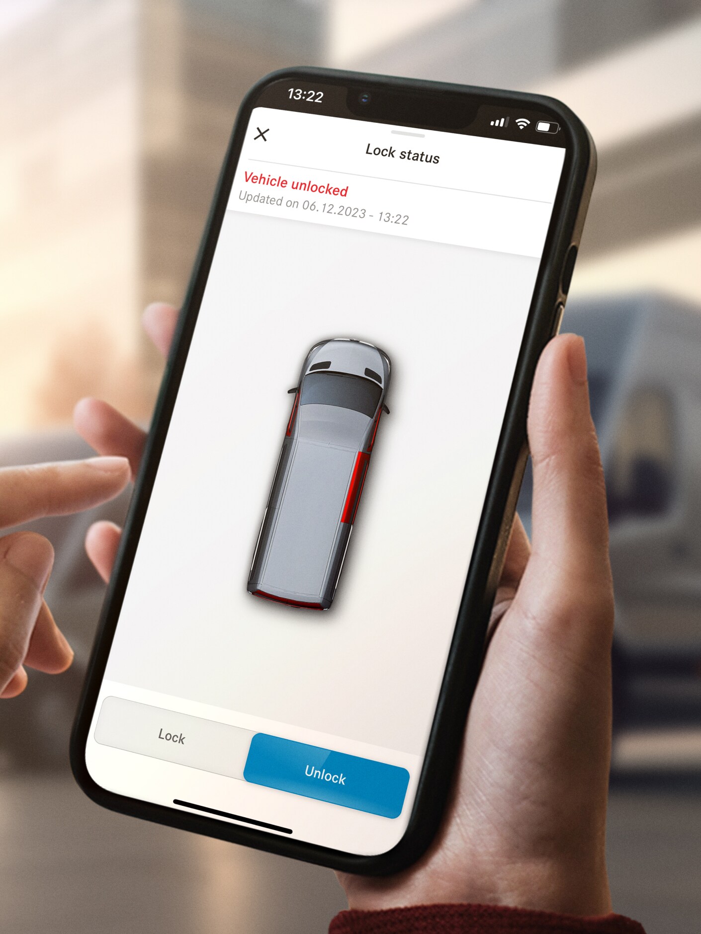 Digital tjeneste Fjernaflåsning og -oplåsning af bilen vises på en smartphone