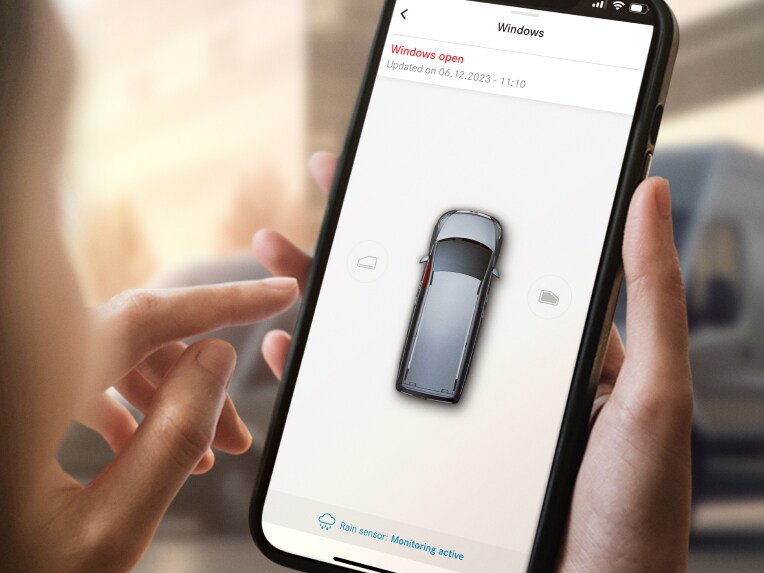 Den digitale tjeneste Fjernlukning og åbning af vinduer vises på en smartphone
